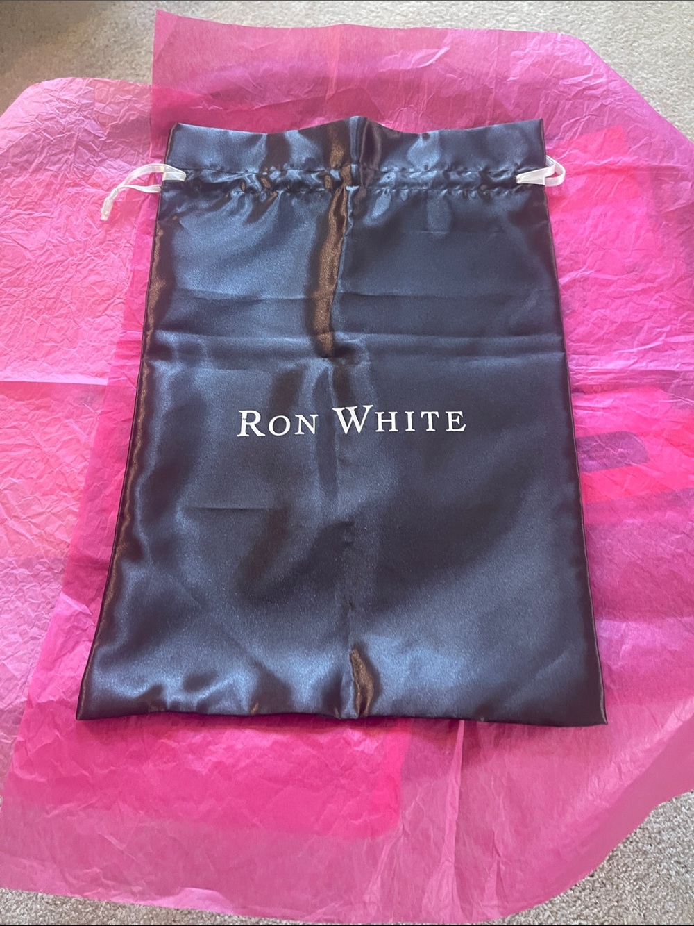 Ron White Satin drawstring bag.